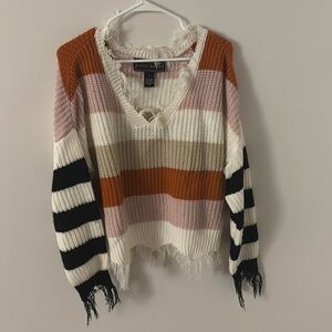 Freyed striped sweater
